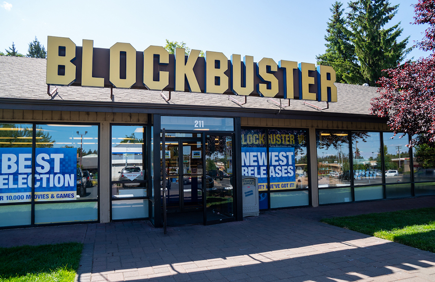 Exterior of the last remaining Blockbuster store, located in Bend, Ore. Credit: melissamn, Shutterstock