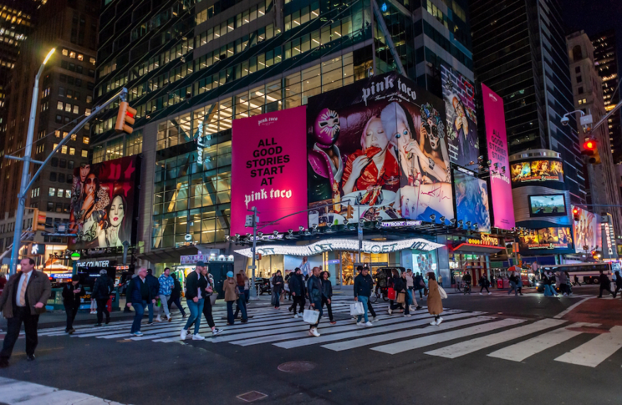 A billboard in Times Square advertises the imminent opening of Pink Taco. PHOTO: Shuttertock, rblfmr
